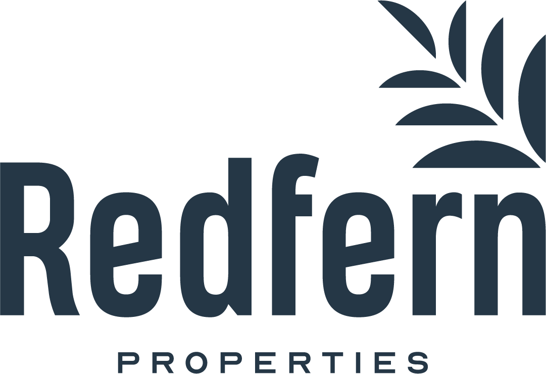 Logo of Redfern Properties with stylized text and palm leaf design.